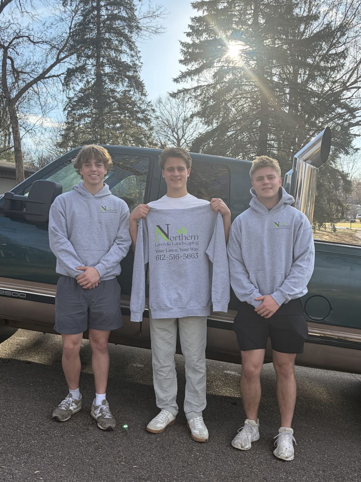 The Northern Lawn & Landscaping crew in front of their truck